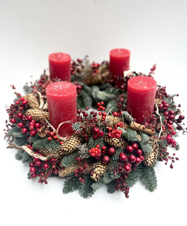 Red candle wreath with forest feeling